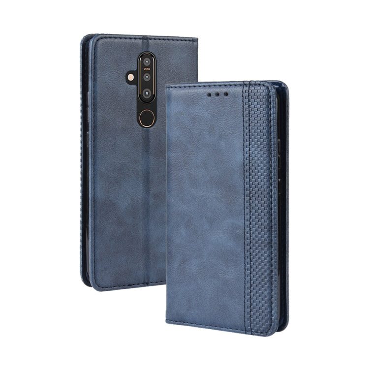 Blue horizontal flip leather phone case with magnetic closure and camera cutout