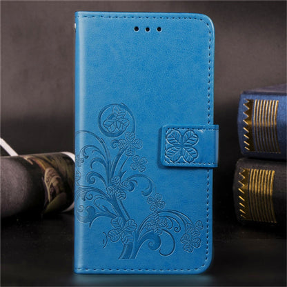 Blue embossed floral phone wallet case with side card holder and stitched edges.
