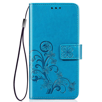 Blue floral embossed phone wallet case with wrist strap and snap card holder.