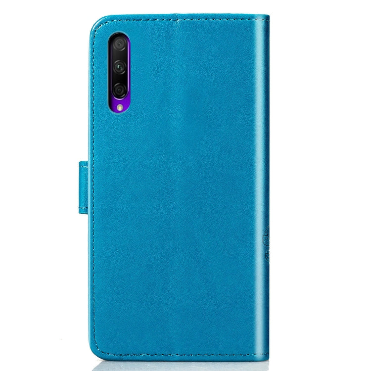 Blue phone wallet case back with camera cutout and smooth cover panel.