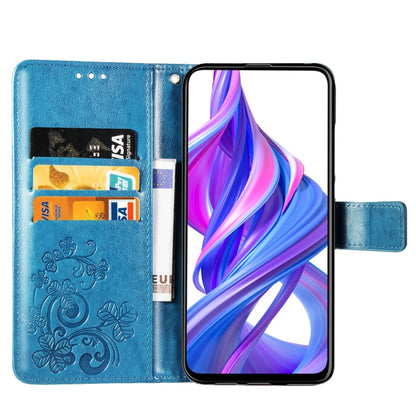 Blue embossed floral phone wallet case open view with card slots and strap.