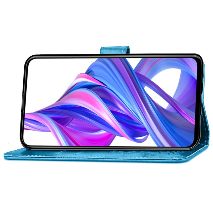 Blue phone wallet case folded stand with embossed floral base.