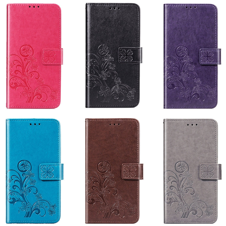 Assorted embossed floral phone wallet cases in multiple colors, with flap closures.