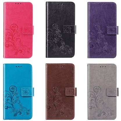 Assorted embossed floral phone wallet cases in multiple colors, with flap closures.