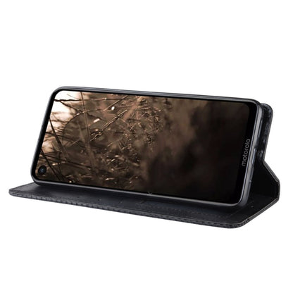 Black leather flip phone case in stand position with camera cutout