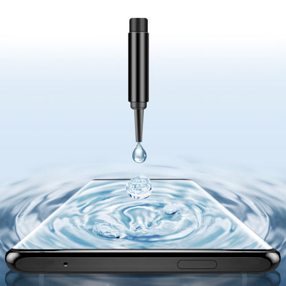 Transparent UV liquid drops onto phone screen, screen protector film