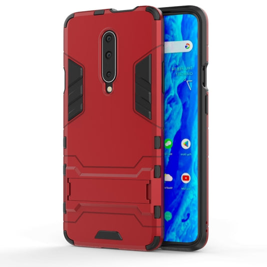 Red shockproof phone case with holder for OnePlus 7 Pro, with camera and port cutouts