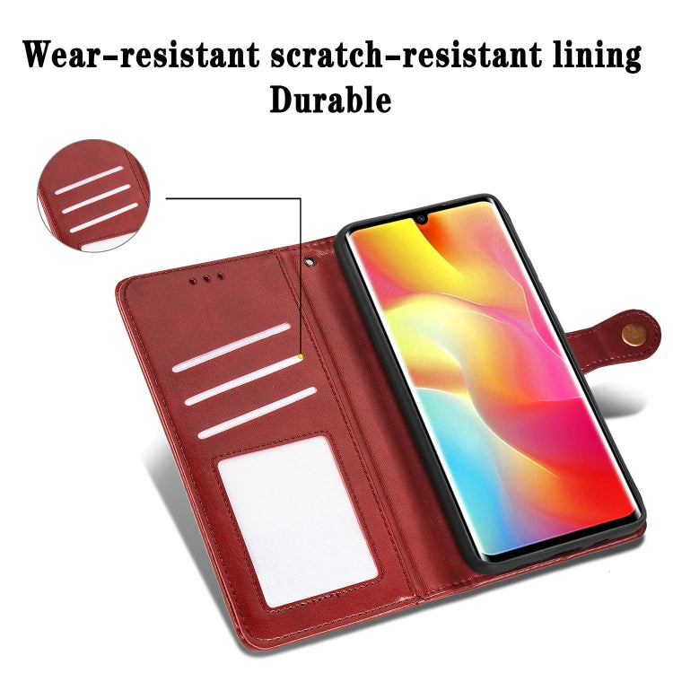 Red leather wallet phone case with card slots, photo window, and magnetic buckle closure