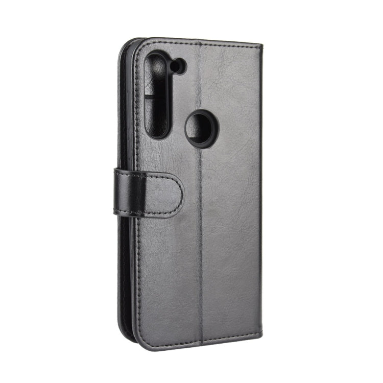 Black textured phone case with camera cutout and fold-over card holder