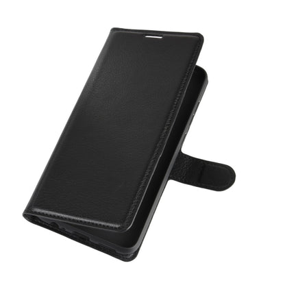 Black litchi-texture folio phone case with side strap and slim back protection