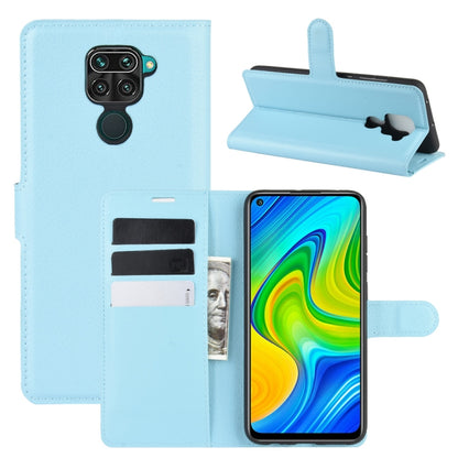 Light blue litchi-texture flip wallet phone case with card slots, stand, and camera cutout