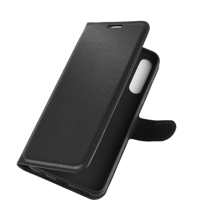 Black flip wallet phone case angled view with side button cutout for Huawei Y6p