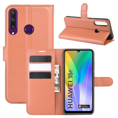 Brown litchi-texture flip phone case with card slots and stand holder for Huawei Y6p