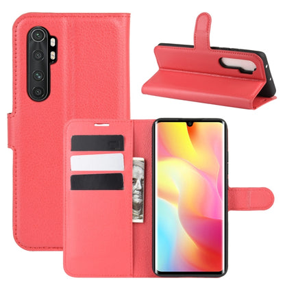 Coral-red phone flip wallet case with litchi texture, card slots, and stand