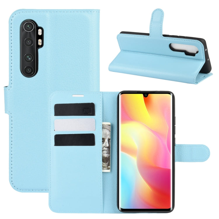 Light blue phone flip wallet case with litchi texture, card slots, and stand