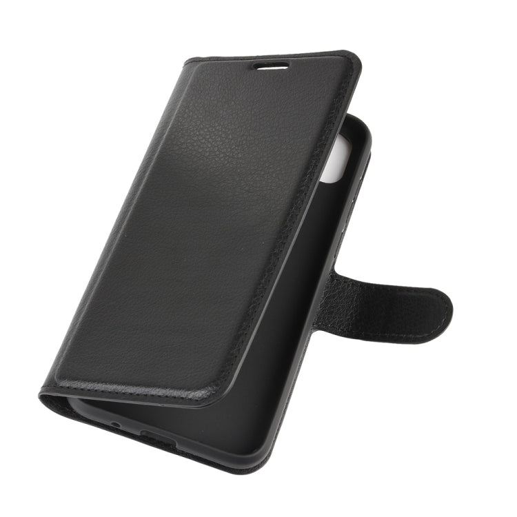 Black leather-look flip wallet phone case with magnetic cover and side strap