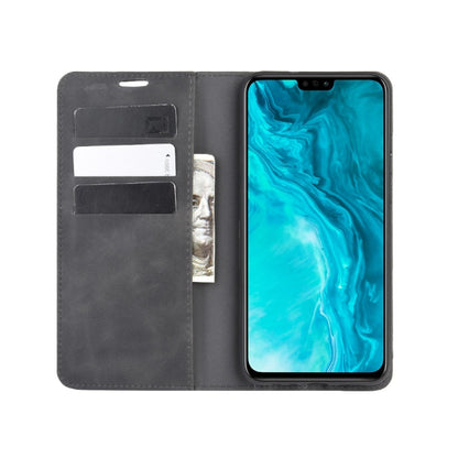 Black leather wallet phone case with card slots, magnetic flap, and phone screen