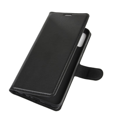 Black flip wallet phone case with smooth fold-over front and hand strap