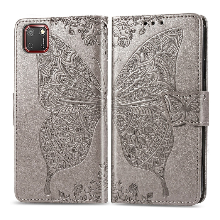 Gray embossed butterfly flip wallet case for Huawei Y5P with strap closure
