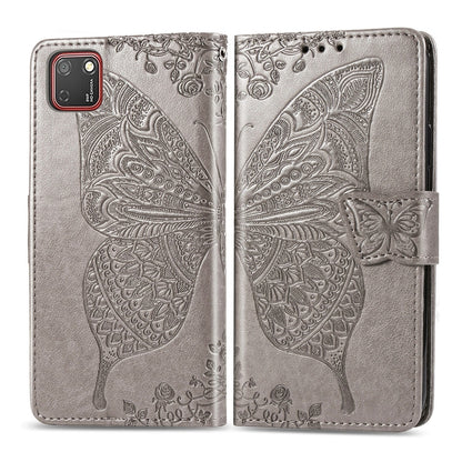 Gray embossed butterfly flip wallet case for Huawei Y5P with strap closure