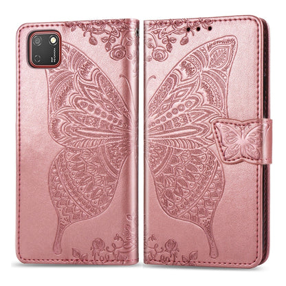 Rose pink embossed butterfly flip wallet case for Huawei Y5P with strap closure