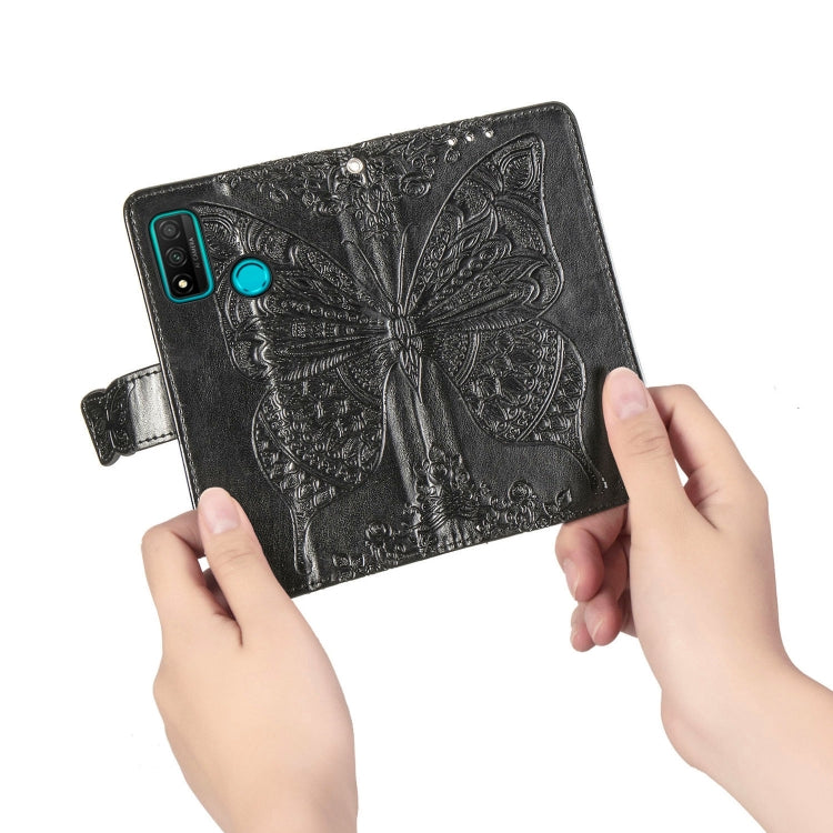 Black embossed butterfly flip phone wallet case with teal button and side hand strap