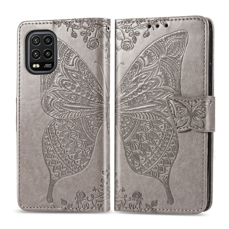 Gray butterfly-embossed flip wallet phone case with magnetic strap and card slots