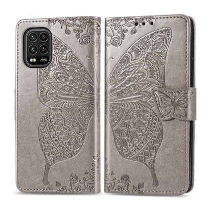 Gray butterfly-embossed flip wallet phone case with magnetic strap and card slots