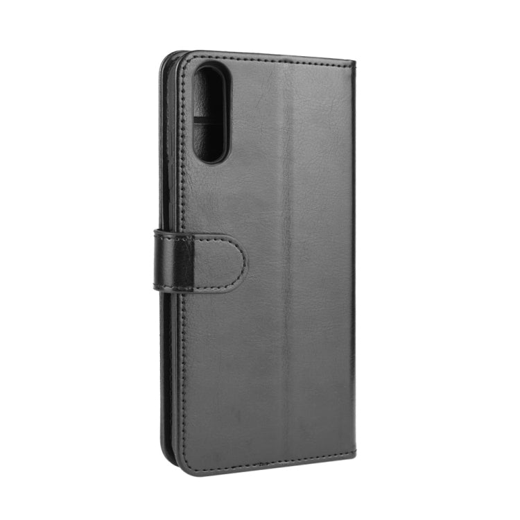 Black flip phone case back with camera cutout and side hand strap