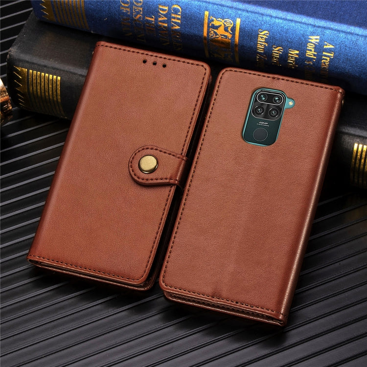 Brown leather-look phone wallet case, front and back view, with round snap buckle