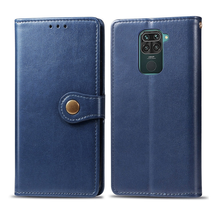 Blue leather-look phone wallet case with round snap buckle closure