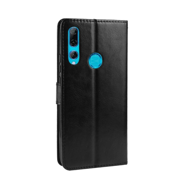 Black leather flip phone wallet case with camera cutouts and circular magnetic clasp for Huawei Y9 Prime (2019)