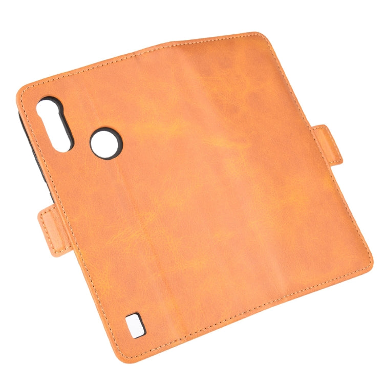 Orange leather flip phone case with camera and speaker cutouts on the outer cover