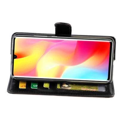 Black horizontal flip phone case with front flap and card slot strip, stand view