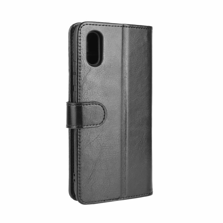 Black vertical flip wallet case with cutout for camera and rear speaker
