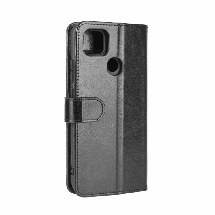 Black folio wallet case with camera cutout, magnetic strap, and card holder panel