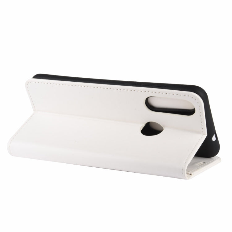 White wallet flip phone case folded into stand with carrying slot and camera cutout