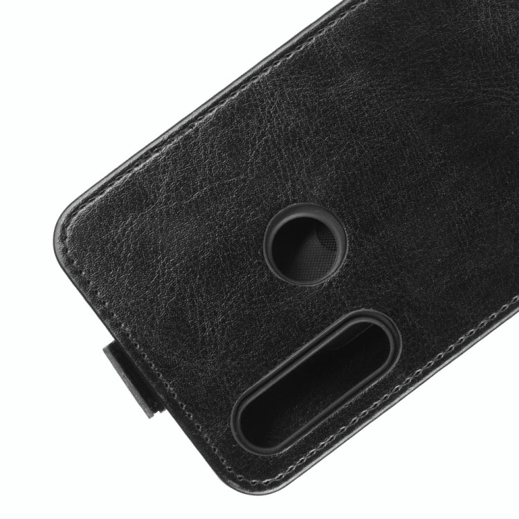 Black leather phone case close-up with camera opening and side cutout