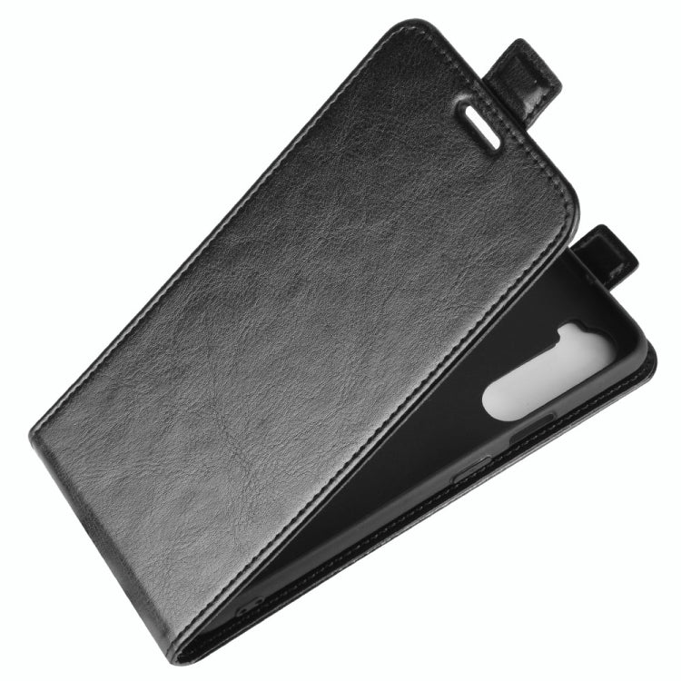 Black leather flip phone case with fold-over cover and camera opening