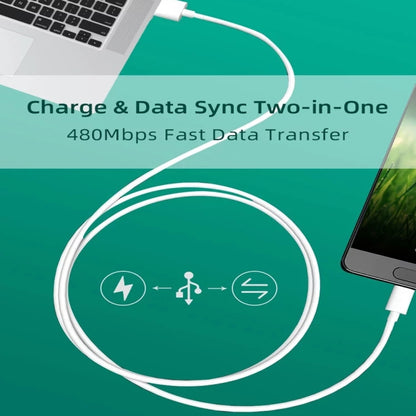 White USB-A to micro-USB charging cable connected to a computer and phone
