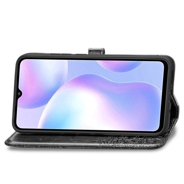 Black embossed flip leather phone case with front viewing cover and side camera cutout