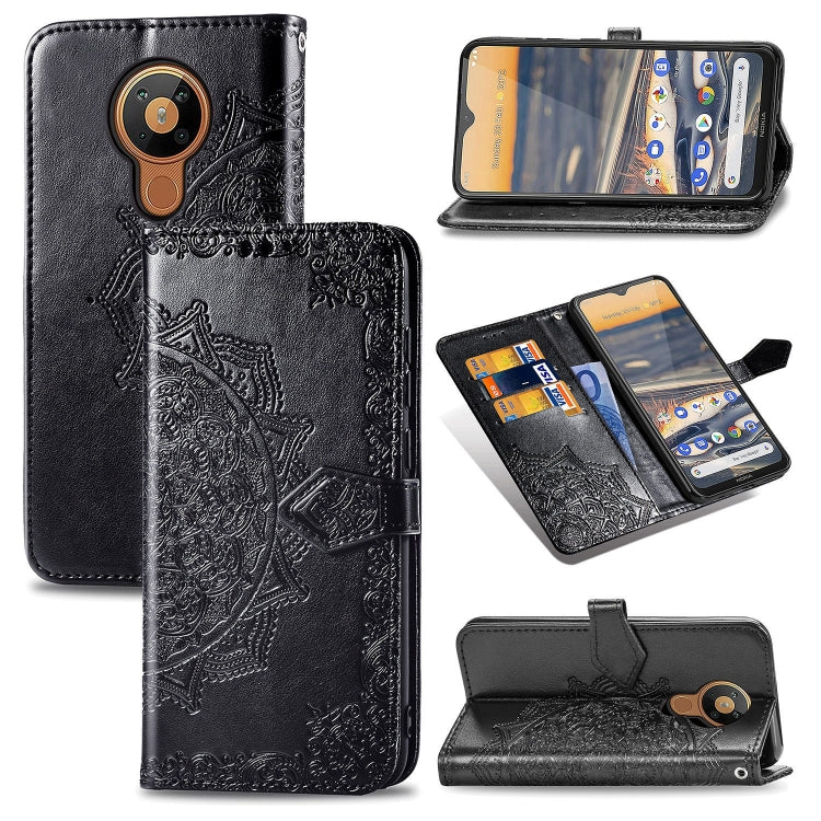 Black embossed flip phone wallet case with camera cutout, visible card slots, and stand view