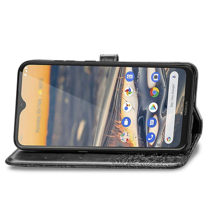 Black embossed leather-style flip wallet with folio cover and phone screen visible