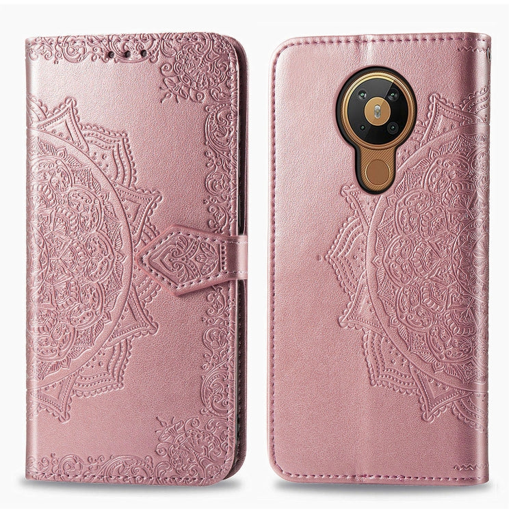 Rose pink mandala-embossed flip leather phone case with card slot and magnetic closure