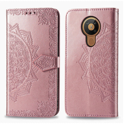 Rose pink mandala-embossed flip leather phone case with card slot and magnetic closure