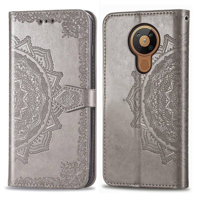 Gray metallic mandala-embossed flip leather phone case with card slot and magnetic closure