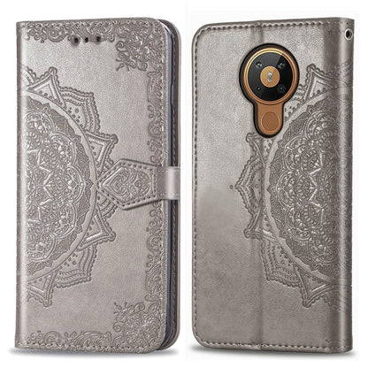 Gray metallic mandala-embossed flip leather phone case with card slot and magnetic closure