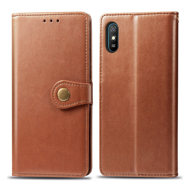 Brown leather wallet phone case with magnetic strap and cutout camera cover