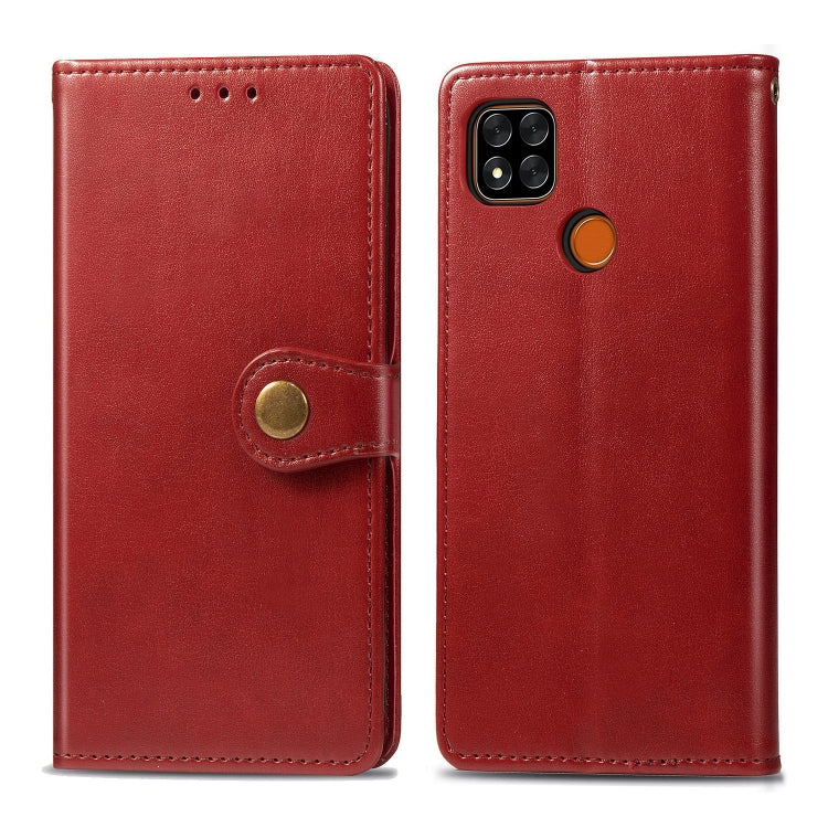 Red leather phone wallet case with buckle strap closure and card slot; rear camera cutout shown.