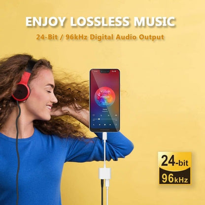 USB-C to 3.5mm adapter connected to smartphone and over-ear headphones